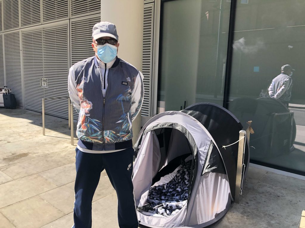 Anthony Sinclair by his tent outside University College London Hospital UCLH in Euston, Camden, London