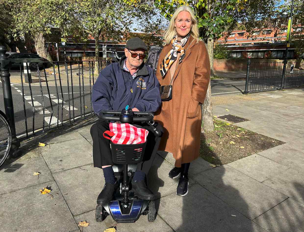 Ms Redmond speaks to voter Dave Bennett during a visit to Somers Town